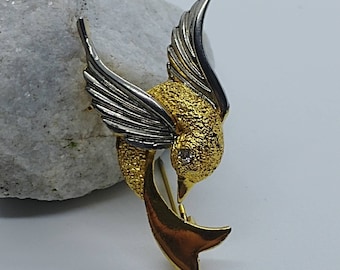 Vintage goudkleurige kolibriebroche met zilveren vleugels