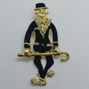 Vintage brooch clown, Harlequin with black enamel.
