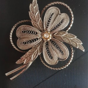 Vintage filigree brooch silver tone