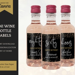 May include: Three mini wine bottles with black labels and gold glitter. The labels have white text that says "eighty - Happy Birthday - James S. aged to perfection", "sixty - Happy Birthday - Mananna aged to perfection", and "cheers - Happy Birthday - Lakeisha fifty and fabulous".