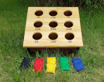 Jeu de lancer de sacs de haricots en bois – Alternative au jeu de lancer de sacs de maïs à 9 trous – Compact, pliable et amusant pour tous les âges !