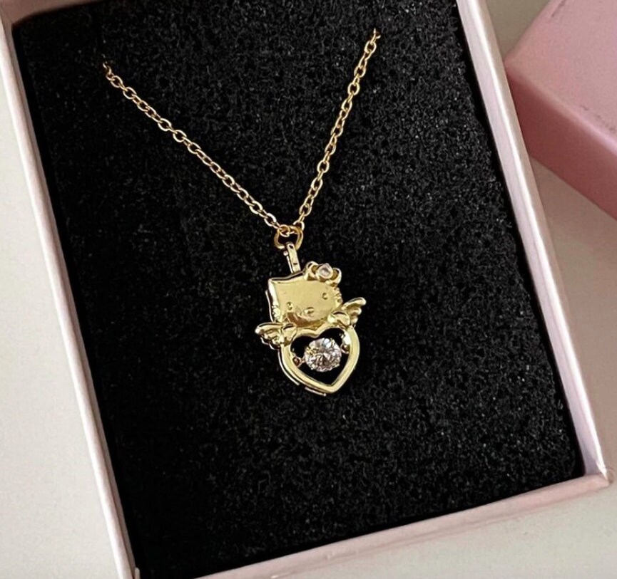 Hello kitty angel and devil necklace deals