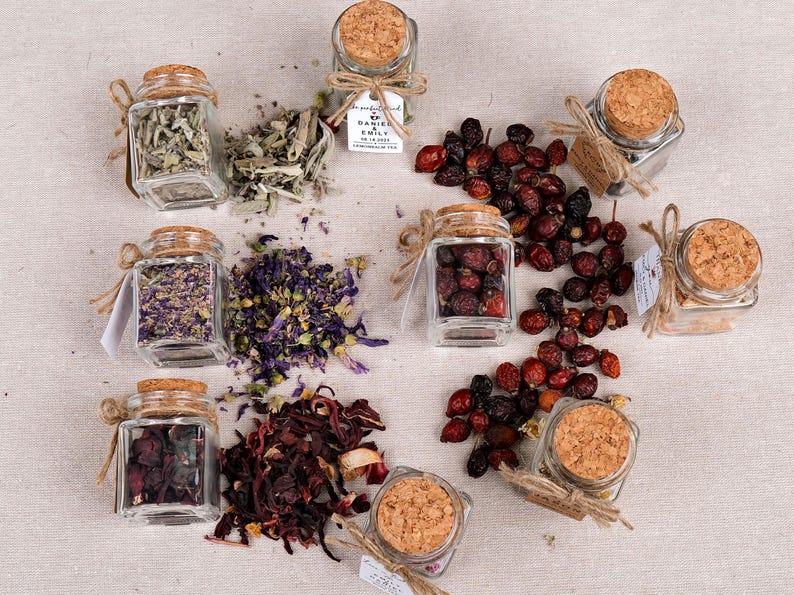 Wedding Tea Favors for Guests – Loose Leaf Herbal Tea Jars | Rustic Wedding Guest Gifts | Personalized Bridal Shower Favors | Tea Party Favors

Delight your guests with these charming Wedding Tea Favors – elegant glass jars filled with premium loose leaf herbal tea, personalized for your special day. These rustic favors are perfect for weddings, bridal showers, tea parties, or engagement celebrations, offering a thoughtful and aromatic thank-you gift your guests will truly enjoy.