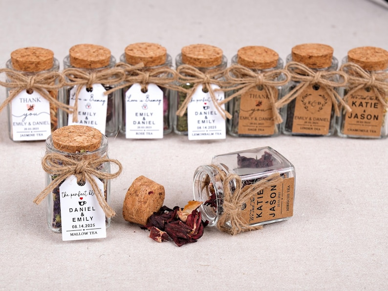 Wedding Tea Favors for Guests – Loose Leaf Herbal Tea Jars | Rustic Wedding Guest Gifts | Personalized Bridal Shower Favors | Tea Party Favors

Delight your guests with these charming Wedding Tea Favors – elegant glass jars filled with premium loose leaf herbal tea, personalized for your special day. These rustic favors are perfect for weddings, bridal showers, tea parties, or engagement celebrations, offering a thoughtful and aromatic thank-you gift your guests will truly enjoy.