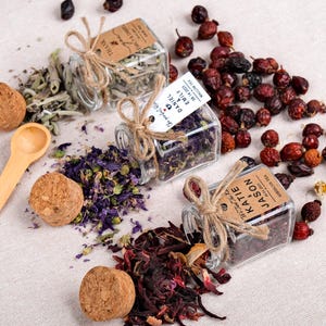 Wedding Tea Favors for Guests – Loose Leaf Herbal Tea Jars | Rustic Wedding Guest Gifts | Personalized Bridal Shower Favors | Tea Party Favors

Delight your guests with these charming Wedding Tea Favors – elegant glass jars filled with premium loose leaf herbal tea, personalized for your special day. These rustic favors are perfect for weddings, bridal showers, tea parties, or engagement celebrations, offering a thoughtful and aromatic thank-you gift your guests will truly enjoy.