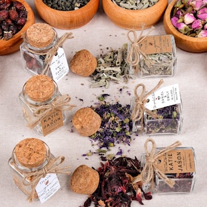 Wedding Tea Favors for Guests – Loose Leaf Herbal Tea Jars | Rustic Wedding Guest Gifts | Personalized Bridal Shower Favors | Tea Party Favors

Delight your guests with these charming Wedding Tea Favors – elegant glass jars filled with premium loose leaf herbal tea, personalized for your special day. These rustic favors are perfect for weddings, bridal showers, tea parties, or engagement celebrations, offering a thoughtful and aromatic thank-you gift your guests will truly enjoy.
