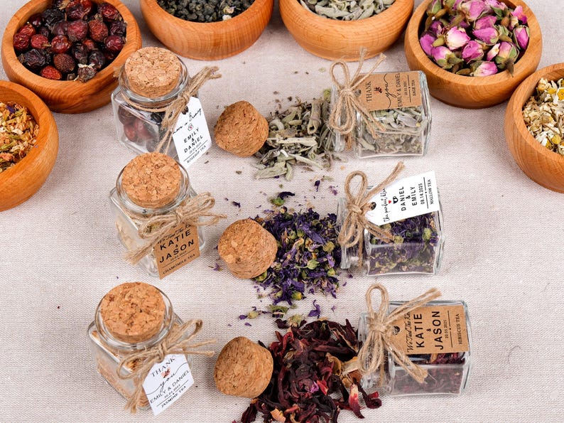 Wedding Tea Favors for Guests – Loose Leaf Herbal Tea Jars | Rustic Wedding Guest Gifts | Personalized Bridal Shower Favors | Tea Party Favors

Delight your guests with these charming Wedding Tea Favors – elegant glass jars filled with premium loose leaf herbal tea, personalized for your special day. These rustic favors are perfect for weddings, bridal showers, tea parties, or engagement celebrations, offering a thoughtful and aromatic thank-you gift your guests will truly enjoy.