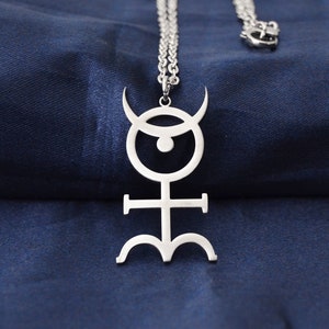 pendant of the hieroglyphic symbol, the hieroglyphic Monad, elemental symbol