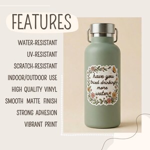 May include: A sage green water bottle with a silver lid and handle. The bottle has a floral sticker that reads "have you tried drinking more water". The image also lists features such as water-resistant and UV-resistant.