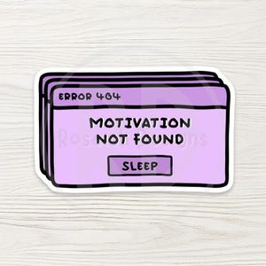 May include: A sticker with a light purple error message design. The text reads "ERROR 404 MOTIVATION NOT FOUND" with a "SLEEP" button. The sticker has a white border and is on a light wood grain background.