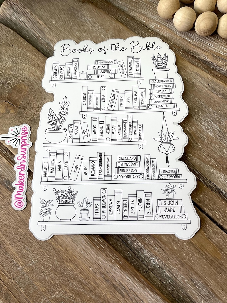 May include: A white sticker featuring a bookshelf design with the words "Books of the Bible" at the top. The sticker includes illustrations of potted plants and the names of the books of the Bible. The sticker has a decorative border.