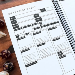 May include: A blank character sheet for a tabletop role-playing game. The sheet has sections for name, class, race, background, alignment, hit points, hit dice, armor class, initiative, strength, dexterity, constitution, intelligence, wisdom, charisma, saving throws, skills, attacks and spells, speed, passive perception, and languages.