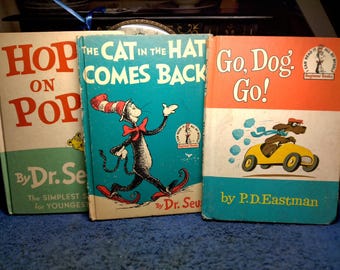 Libri del primo anno del Dr. Seuss. Hop on Pop, Go Dog Go, The Cat In the Hat Comes Back. Anni 1958, 1961 e 1963. Set di tre.