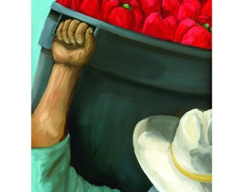 May include: A person wearing a white hat and a teal shirt carries a large black bucket filled with red bell peppers.