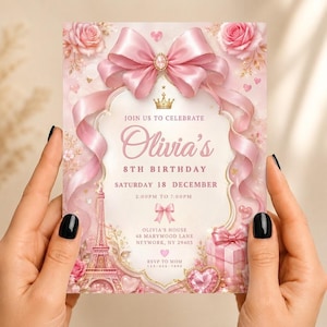 May include: A rectangular birthday invitation card featuring a large pink satin bow at the top, a gold crown, and an Eiffel Tower illustration. The text reads: Join us to celebrate Olivia's 8th birthday, Saturday 18 December, 2:00pm to 7:00pm, Olivia's house, 48 Marywood Lane, Neywork, NY 29403, RSVP to Mom 123-456-7890.