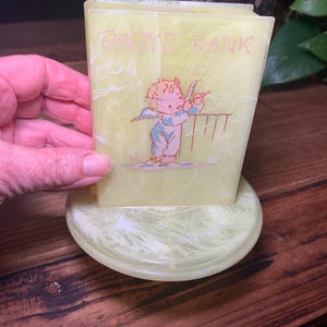 Baby&#39;s Bank- Yellow Marbled Plastic Book Shaped Baby Bank Baby Shower Gift Baby Coin Bank Vintage Plastic Bank Book Shaped Piggy Bank