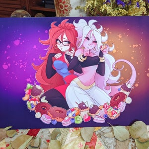 May include: Two anime characters, one with red hair and one with pink hair, are surrounded by a variety of colourful pastries and desserts. The characters are wearing colourful outfits and are smiling. The background is a purple and orange gradient with white speckles.