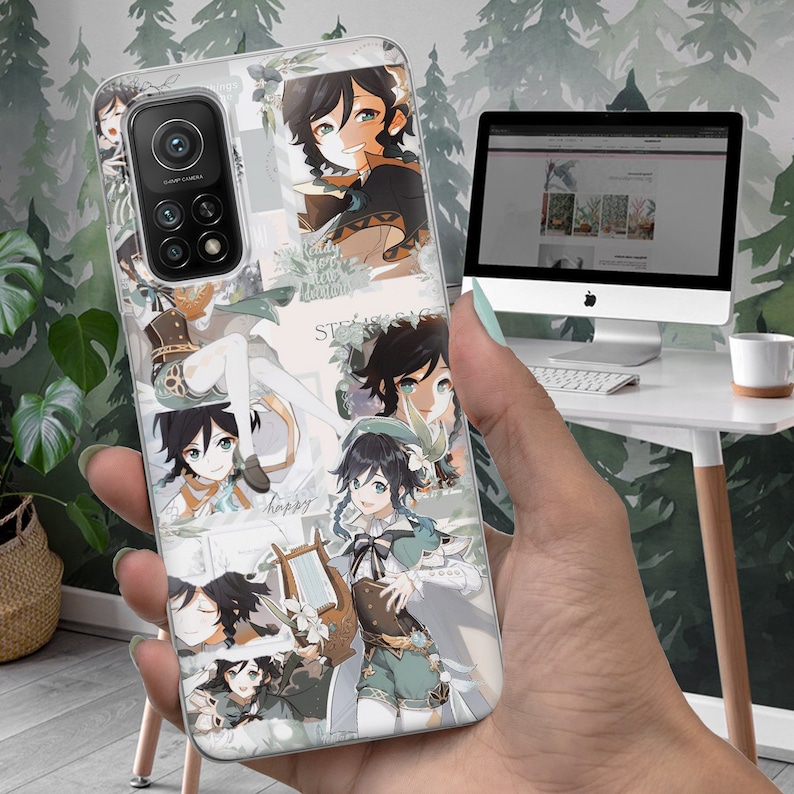 May include: A white phone case with a collage of anime characters. The characters are all wearing green and brown clothing. The case has a white background with green and brown accents. The text "Stay Strong" is visible on the case.