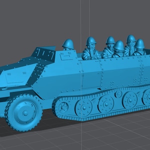 May include: A blue plastic model of a tracked armored vehicle with a crew of soldiers inside. The vehicle has a large, open top and a single, large wheel on the front.