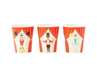 May include: Three paper cups with circus themed designs. The cups are white with red and gold accents. The designs feature a strongman, a magician, and a ballerina.