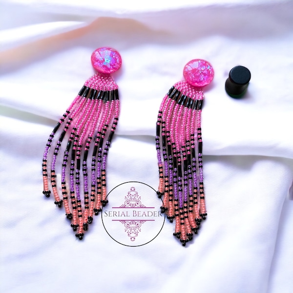 Indigenous beadwork neon pink dangle earrings your choice of black or pink covers for plugs.