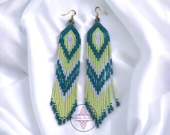 Turquoise and neon green shoulder dusters