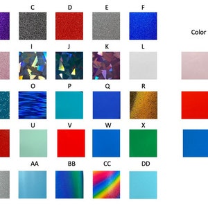 Może przedstawiać: Tabela z 26 r&oacute;żnymi kolorami winylu, w tym błyszczącymi, metalicznymi i tęczowymi wykończeniami. Tabela zawiera r&oacute;wnież trzy przykłady winylu zmieniającego kolor, kt&oacute;ry zmienia się z r&oacute;żowego na magenta, z czerwonego na ż&oacute;łty i z niebieskiego na turkusowy.