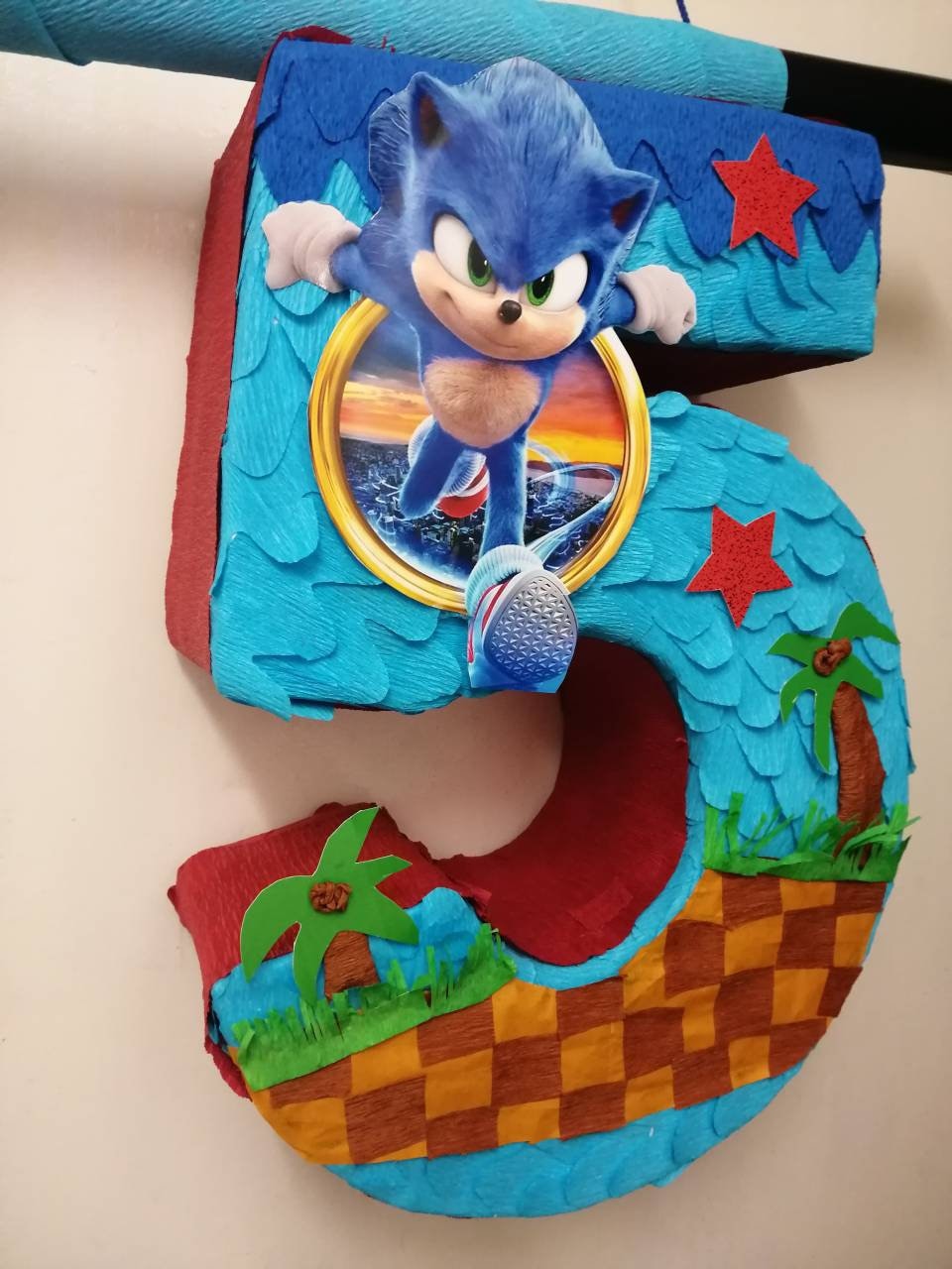 Sonic number 5 pinata with stick pinata included. We can make any custom  pinata on request