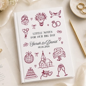 May include: A white hardcover book titled LITTLE NOTES FOR OUR BIG DAY with the names Sarah & David and the date 08.06.2026. The cover features maroon line art illustrations of a ring box, bouquet, doves, rings, disco ball, church, car, cake, and glasses.