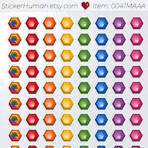 May include: Sheet of colorful hexagon stickers in a rainbow gradient. Each sticker has a detailed design within the hexagon. The sheet includes the text "StickerHuman.etsy.com" and "Item: 0041MAAA".