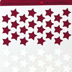 May include: A sheet of star-shaped stickers in red, white, and navy blue. The stickers are arranged in rows, with the red stars at the top, white in the middle, and navy blue at the bottom. The text "StickerHuman.etsy.com" is at the top.