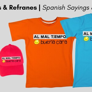 May include: A digital download of a Spanish saying, "Al mal tiempo, buena cara", which translates to "To bad weather, a good face." The saying is displayed on a t-shirt, a baseball cap, and a white square. The t-shirt is orange and the baseball cap is pink.