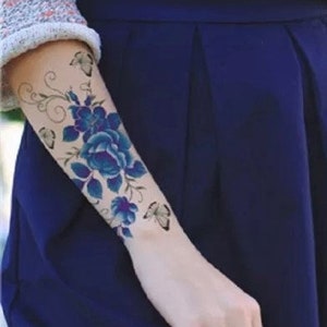 dark blue flower tattoo