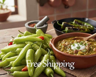May include: A rustic image featuring a pile of fresh, green chili peppers with a few red ones. A bowl of green chili stew with a dollop of cream and a wooden spoon is next to a black pan of roasted peppers. A mortar and pestle are in the background.