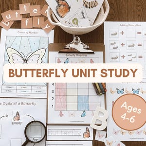 May include: A butterfly unit study educational set featuring printed worksheets, a clipboard, a magnifying glass, and letter cutouts. The materials include a color-by-number butterfly, a graphing chart, a life cycle diagram, and math addition sheets.