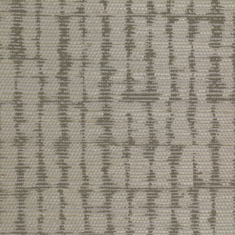 May include: A close-up of a woven fabric with a subtle geometric pattern in shades of gray and white.