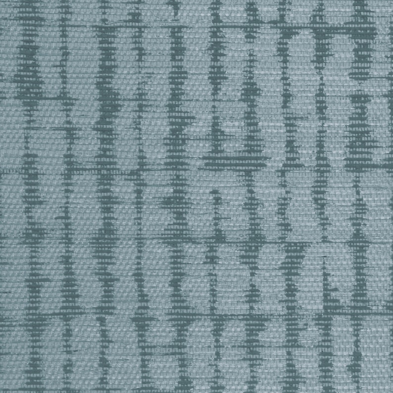 May include: A close-up of a blue woven fabric with a textured pattern. The fabric has a subtle sheen and a slightly rough texture.