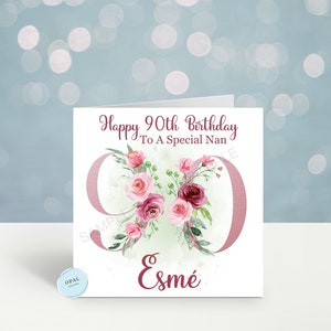 May include: A pink and white floral birthday card with the text "Happy 90th Birthday To A Special Nan" and the name "Esme" in a pink floral design.