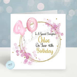 May include: A white card with a pink and gold design. The card says "To a Special Daughter Chloe On Your 40th Birthday".