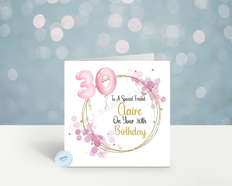 May include: A pink and gold birthday card with a circle of pink and gold confetti and the number 30 in pink balloons. The text reads "To a Special Friend Claire On Your 30th Birthday".