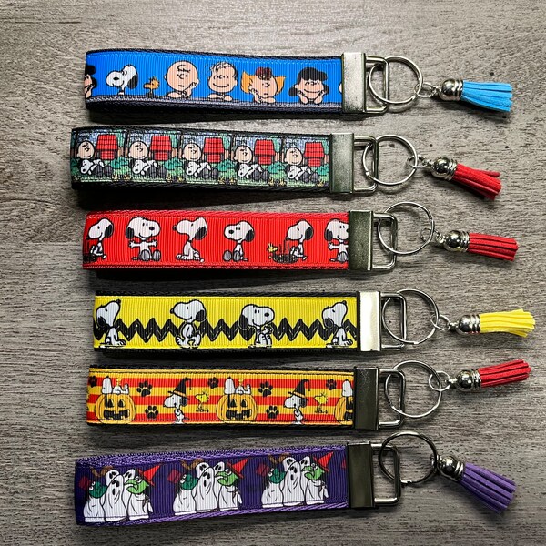 Porte-clés sur le thème des cacahuètes, beagle, Charlie, Lucy, Linus, -- Porte-clés avec bracelet