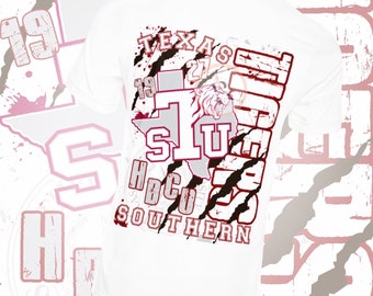 May include: White t-shirt with a graphic design featuring a tiger paw print, the text "Texas Southern", and the number "1" in a red and white color scheme. The graphic also includes the text "HBCU" and the outline of the state of Texas.