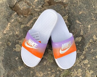 nike orange sliders