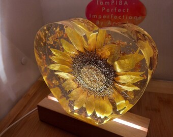 Real Sunflower Resin Heart-shaped block with gold & rose gold flakes background. Decor. Paperweight. USB-corded light pedestal included.