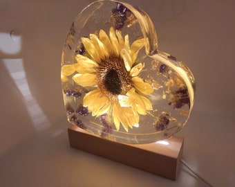 Real, Dried Sunflower Heart-shaped Block. Sunflower paperweight w/ purple Statice flowers & gold flakes! USB-corded light pedestal included.
