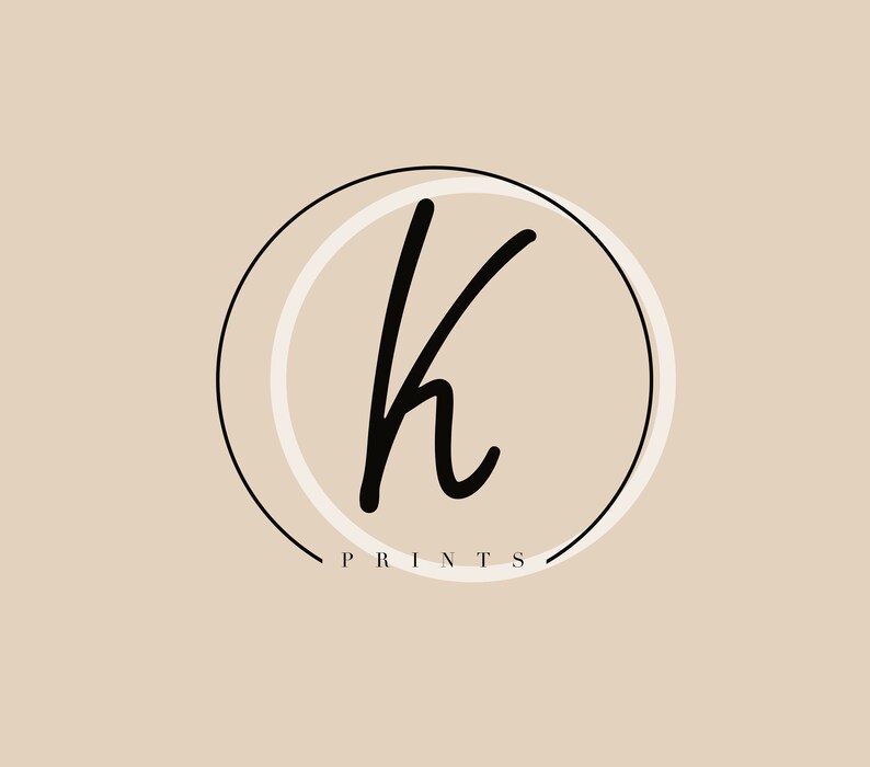 May include: A black and white logo with the letter "K" in a handwritten font inside a circle with a white outline. The text "PRINTS" is below the circle.