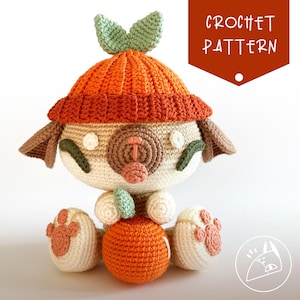 Puede incluir: Patrón de crochet para un adorable juguete amigurumi con temática de naranja. El juguete es un perro que lleva un gorro naranja y sostiene una naranja. El patrón está disponible para descargar.