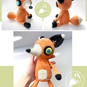 Peut inclure: Un jouet en peluche de renard crochet&eacute; avec une fourrure orange et blanche, des oreilles et une queue noires, et un grand &oelig;il bleu. Le jouet est pr&eacute;sent&eacute; dans trois poses diff&eacute;rentes, assis, debout et avec sa queue enroul&eacute;e autour de ses jambes. Le jouet est &eacute;tiquet&eacute; "Corps complet assembl&eacute;".