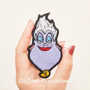 May include: Embroidered patch featuring the character Ursula from The Little Mermaid. The patch has a purple body, white hair, and a red smile. The text "Digital Download" is at the bottom.