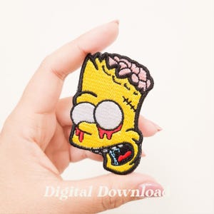 May include: Embroidered patch featuring a zombie-themed cartoon character with yellow skin, white eyes, and exposed pink brain. The character has red blood dripping from its eyes and mouth. The patch is outlined in black and has the text "Digital Download".